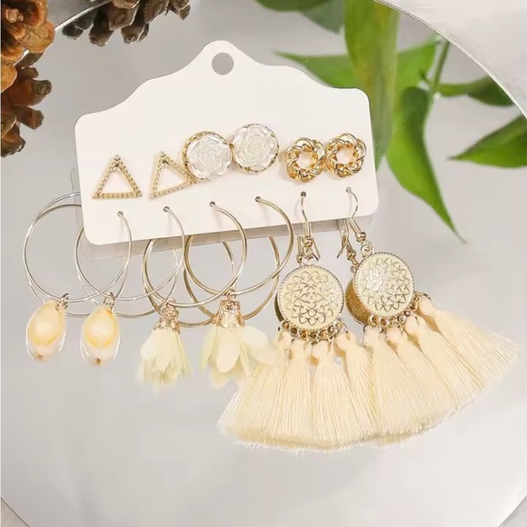 Gold and Cream Filigree Tassel Earrings
0431 - Picture 3 of 7